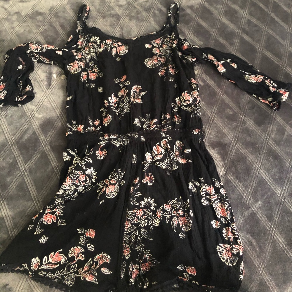 A beautiful only used once romper.